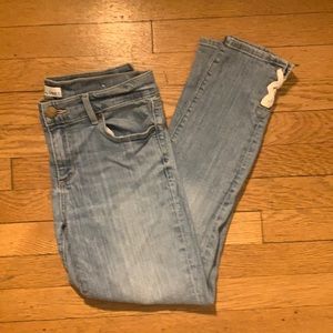 Light wash Loft skinny jeans with ankle detail